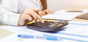 a person building a price quote on a print job